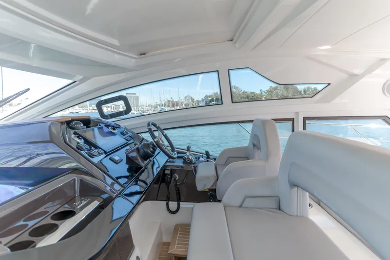 Slide: The Image of Interior view of 2019 Beneteau Gran Turismo 46 yacht cockpit with modern controls. - 22