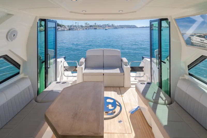 Slide: The Image of Luxurious interior of 2019 Beneteau Gran Turismo 46 yacht with waterfront view. - 24
