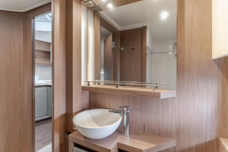 Slide: The Image of Luxurious bathroom interior of 2019 Beneteau Gran Turismo 46 yacht with modern fixtures. - 36