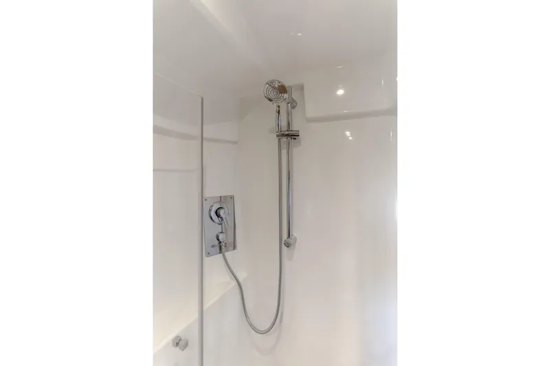 Slide: The Image of Shower area in 2019 Beneteau Gran Turismo 46 yacht, featuring modern fixtures. - 37