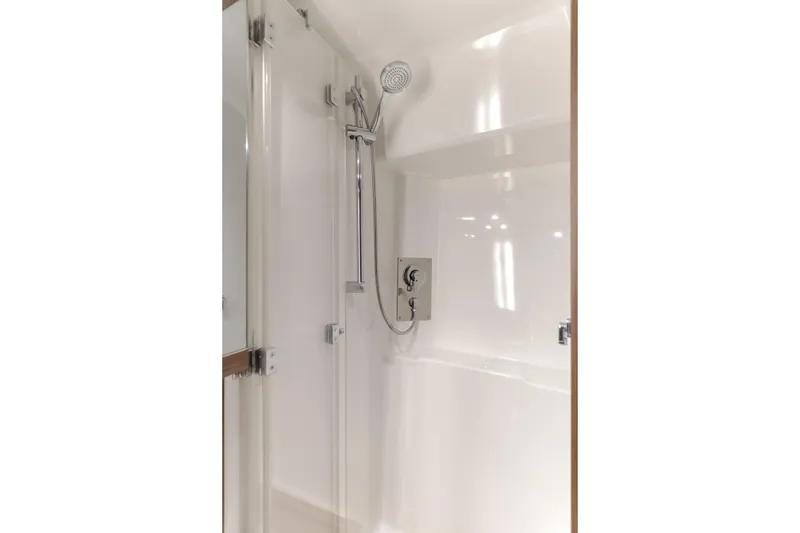 Slide: The Image of Shower area in 2019 Beneteau Gran Turismo 46 yacht, featuring modern fixtures and sleek design. - 41