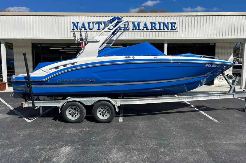 Slide: The Image of 2017 Chaparral 227 SSX Surf boat on trailer at Nautic Marine dealership. - 10