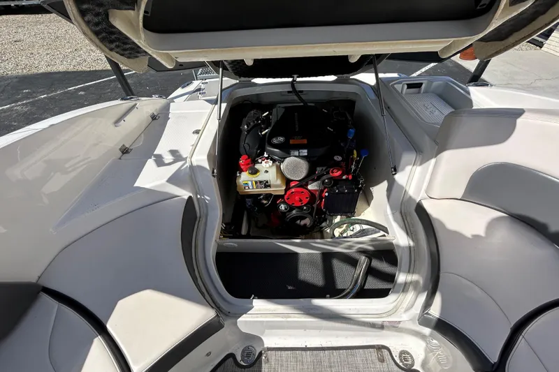 Slide: The Image of Engine compartment of a 2017 Chaparral 227 SSX Surf boat, showcasing interior details. - 24