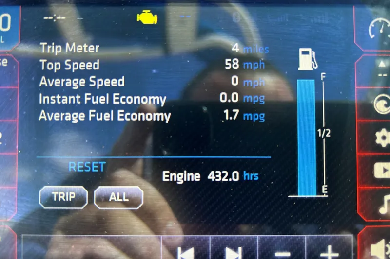 Slide: The Image of Dashboard display of a 2017 Chaparral 227 SSX Surf showing trip and fuel data. - 27