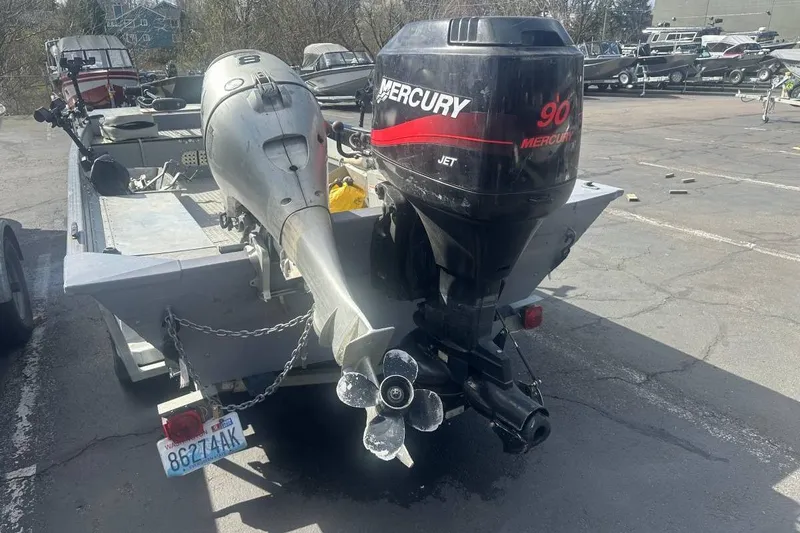Slide: The Image of 2002 Smoker Craft Sportsman 1860 DLX boat with dual Mercury outboard motors. - 6