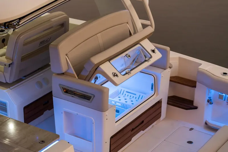 Slide: The Image of Manufacturer Provided Image: Boston Whaler 380 Realm 2022 boat interior with illuminated storage compartment. - 12