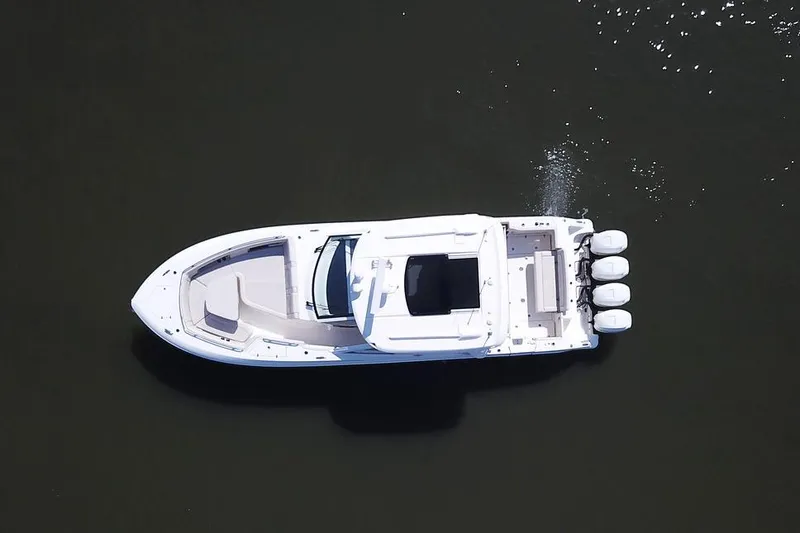 Slide: The Image of Manufacturer Provided Image: Aerial view of a 2022 Boston Whaler 380 Realm boat on water. - 3