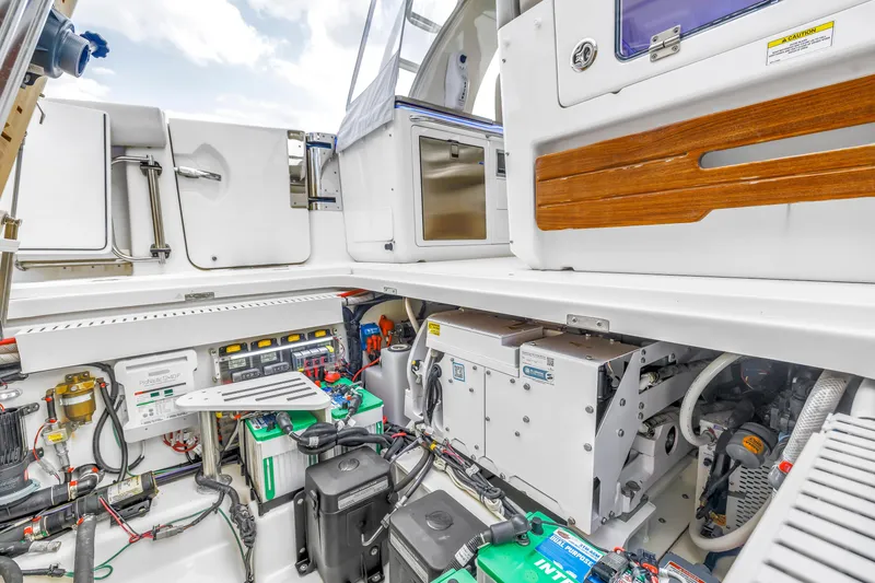 Slide: The Image of Engine compartment of 2022 Boston Whaler 380 Realm, showcasing advanced marine equipment. - 30