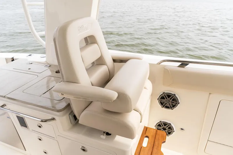 Slide: The Image of Manufacturer Provided Image: Luxury seating on 2022 Boston Whaler 380 Realm boat with ocean backdrop. - 9