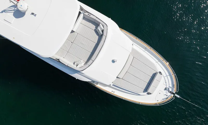 Slide: The Image of Aerial view of 2025 Sirena 48 yacht on calm water. - 13