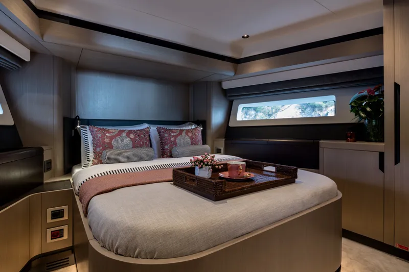 Slide: The Image of Luxurious cabin interior of 2027 Sirena 48 yacht with elegant bedding and window view. - 33