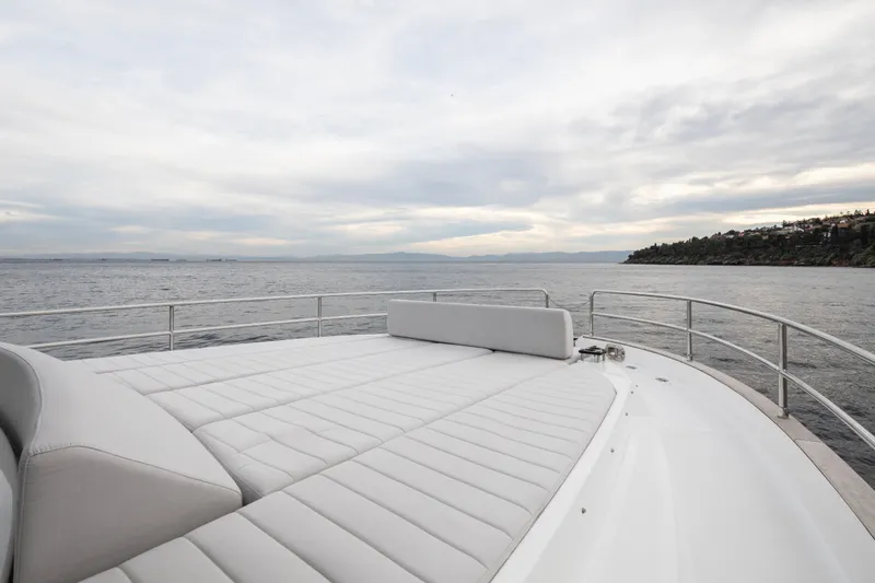 Slide: The Image of Luxurious deck of 2027 Sirena 48 yacht with ocean view and plush seating. - 16
