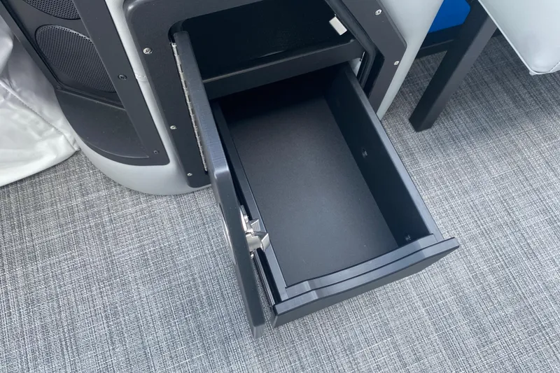 Slide: The Image of Open storage drawer in JC Sporttoon 26TT, 2025 model, on textured flooring. - 14