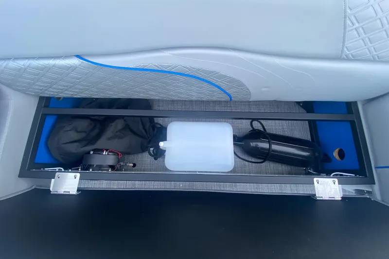 Slide: The Image of Under-seat storage in 2025 JC Sporttoon 26TT boat, featuring organized compartments. - 34