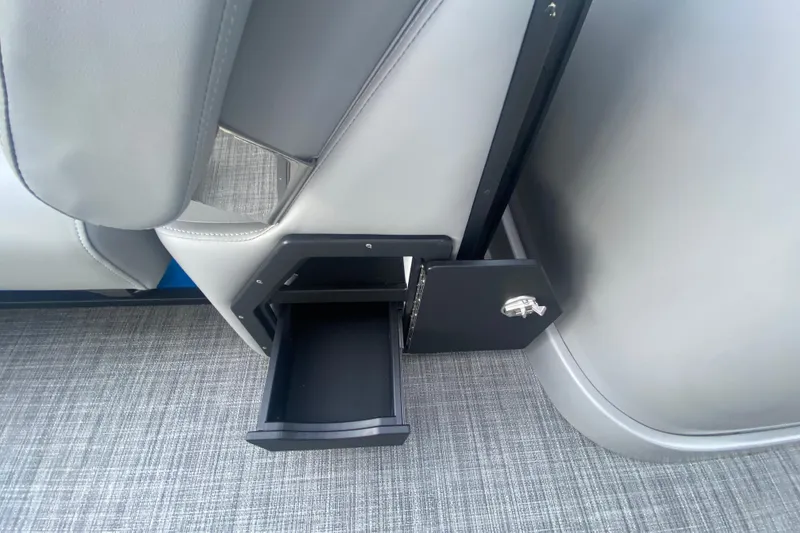 Slide: The Image of Hidden storage compartment in JC Sporttoon 26TT 2025 boat, featuring sleek design and secure latch. - 35