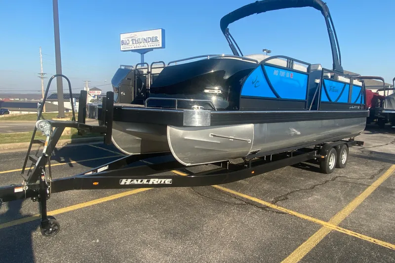 Slide: The Image of 2025 JC Sporttoon 26TT pontoon boat on HaulRite trailer at Big Thunder Boating Center. - 38