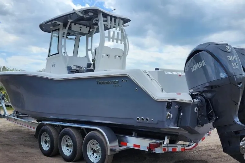 Slide: The Image of 2023 Tidewater 292 CC Adventure boat on trailer with Yamaha engine. - 3