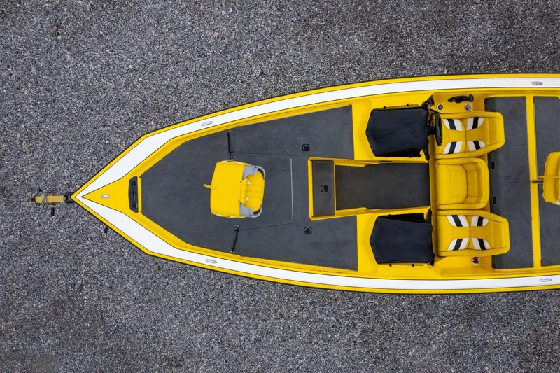 Slide: The Image of Yellow Bullet 20XDC 2002 boat, top view on gravel surface. - 32