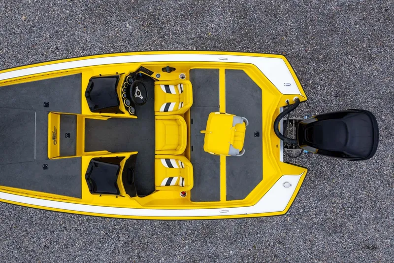 Slide: The Image of Overhead view of a 2002 Bullet 20XDC boat with yellow and gray interior. - 33