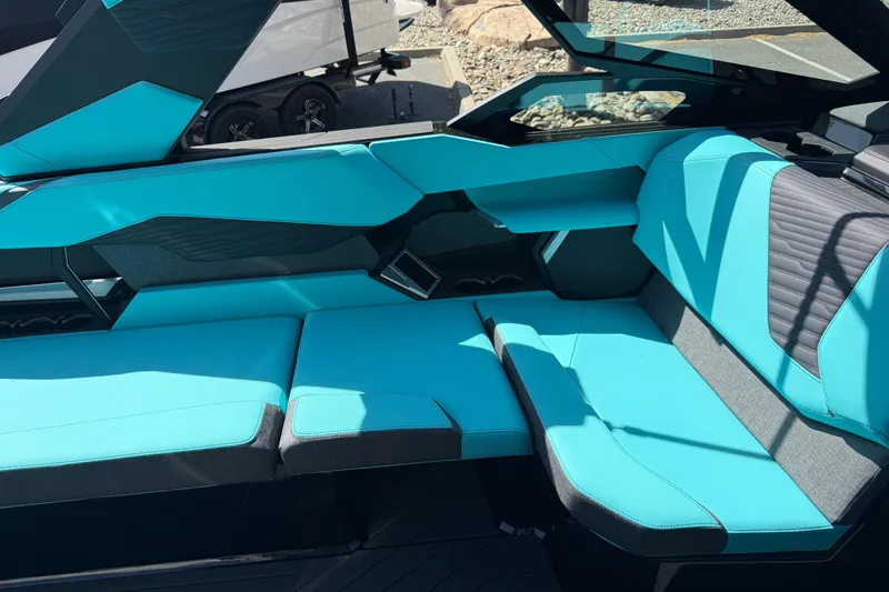 Slide: The Image of Interior of 2026 MasterCraft X24 boat with turquoise seating and modern design. - 40