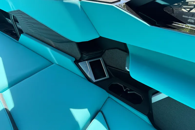 Slide: The Image of 2026 MasterCraft X24 interior with turquoise seating and modern design elements. - 43