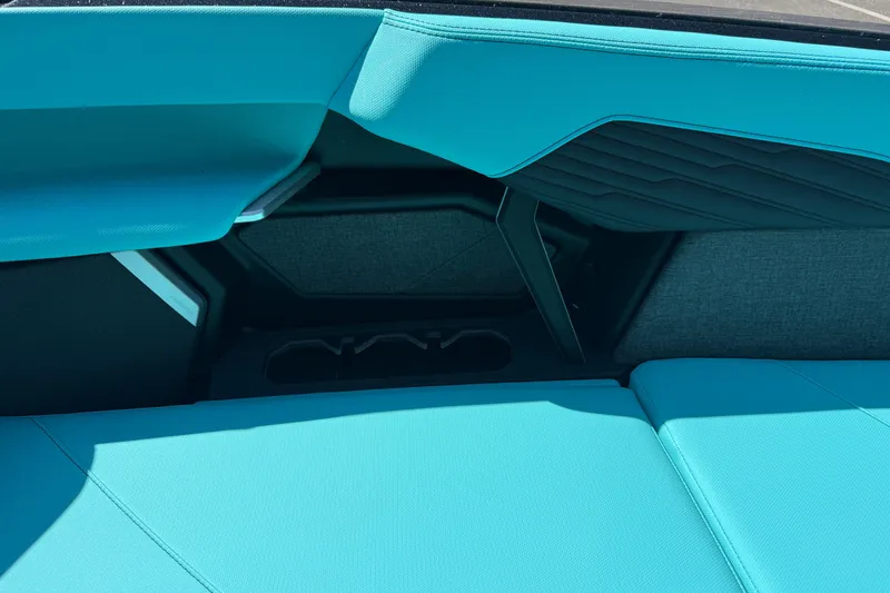 Slide: The Image of 2026 MasterCraft X24 interior with turquoise upholstery and modern design elements. - 53