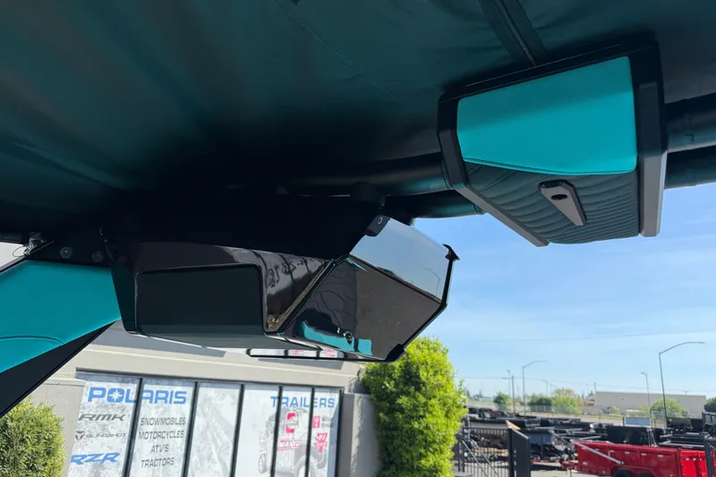 Slide: The Image of 2026 MasterCraft X24 boat speakers and canopy detail in outdoor setting. - 62