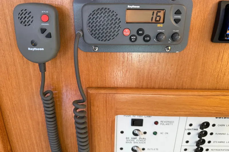 Slide: The Image of Raytheon marine radio and control panel on 2000 Catalina 36 MkII sailboat. - 39