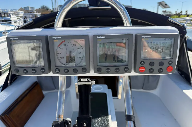 Slide: The Image of Cockpit of 2000 Catalina 36 MkII with Raytheon navigation instruments. - 9