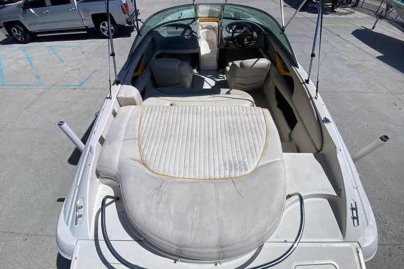 Slide: The Image of 2003 Monterey 208SI Montura boat interior with seating and steering wheel. - 12