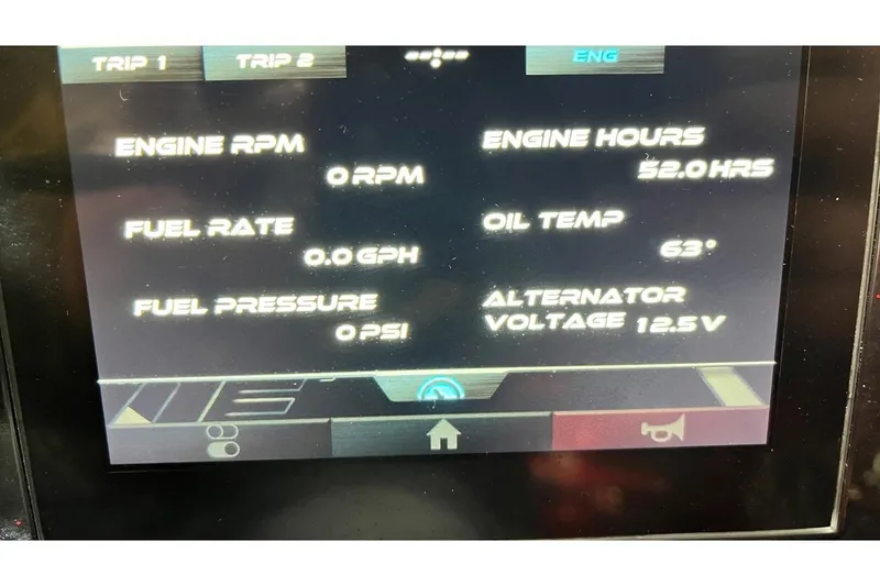 Slide: The Image of 2024 Bass Cat Puma STS dashboard displaying engine metrics and performance data. - 14