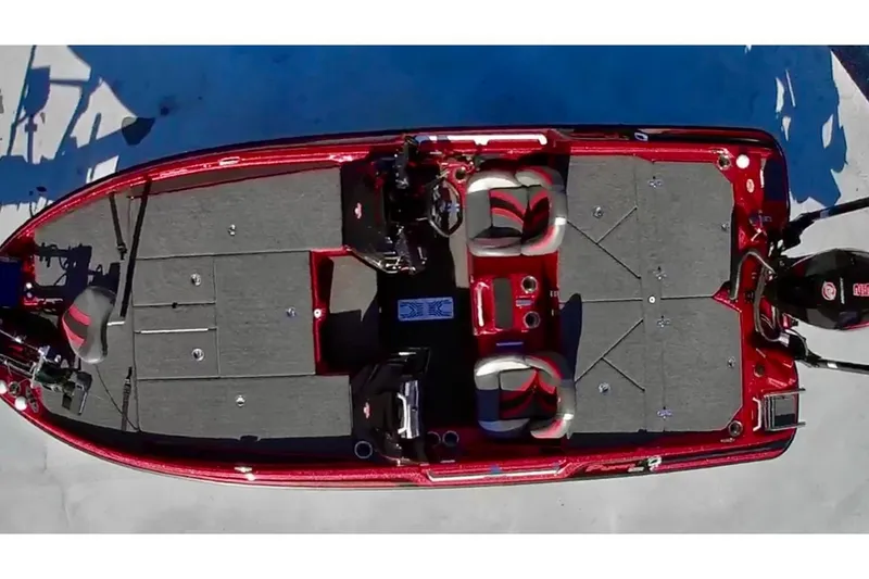 Slide: The Image of 2024 Bass Cat Puma STS boat, aerial view, red and gray interior, dual seating. - 3