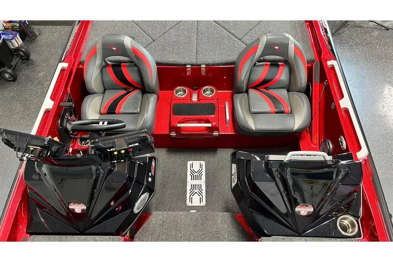 Slide: The Image of 2024 Bass Cat Puma STS interior with dual seats and modern dashboard design. - 8