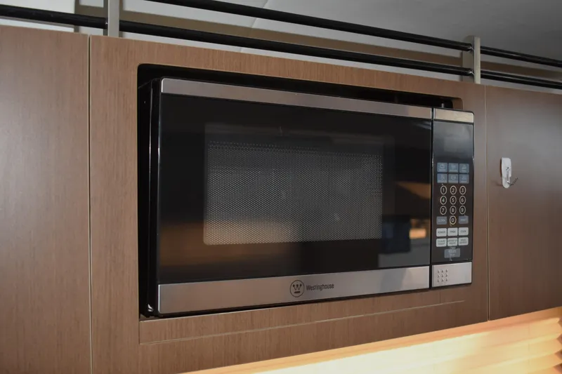Slide: The Image of Built-in microwave in 2016 Sea Ray Sundancer 310 yacht kitchen. - 40