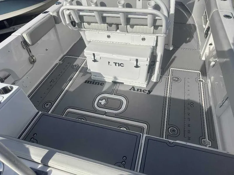 Slide: The Image of Interior of a 2022 Sea Fox 268 Commander boat with gray flooring. - 3