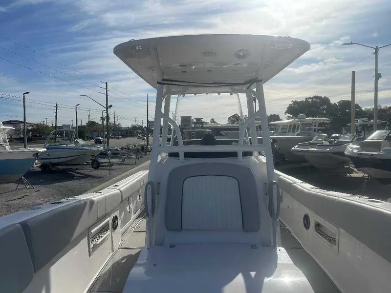 Slide: The Image of 2022 Sea Fox 268 Commander boat on a sunny parking lot. - 8