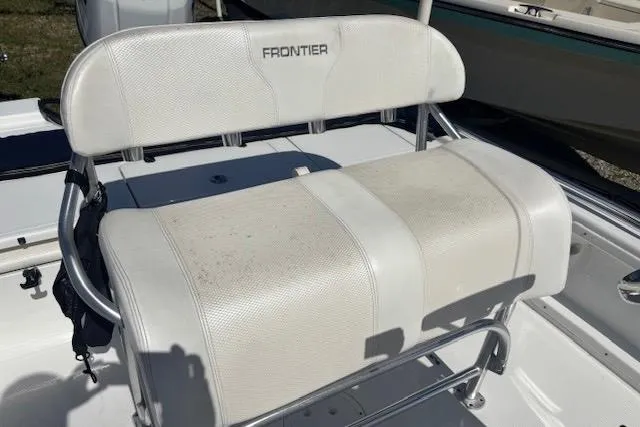 Slide: The Image of White Frontier 2104 boat seat, 2022 model, with metal frame and slight wear. - 13