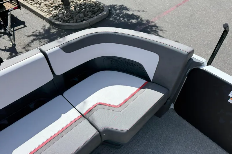 Slide: The Image of 2025 Manitou Cruise boat seating with modern design and red accents. - 19