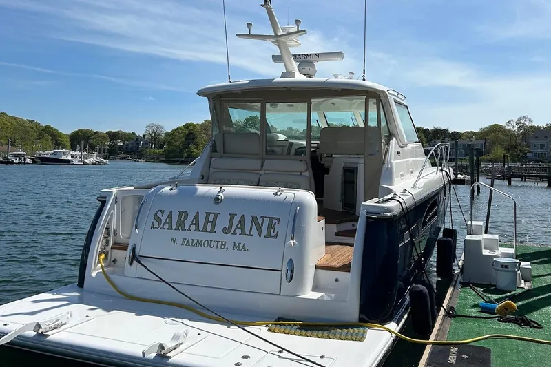 Slide: The Image of 2006 Tiara Yachts 4400 Sovran docked, named "Sarah Jane," in North Falmouth, MA. - 1