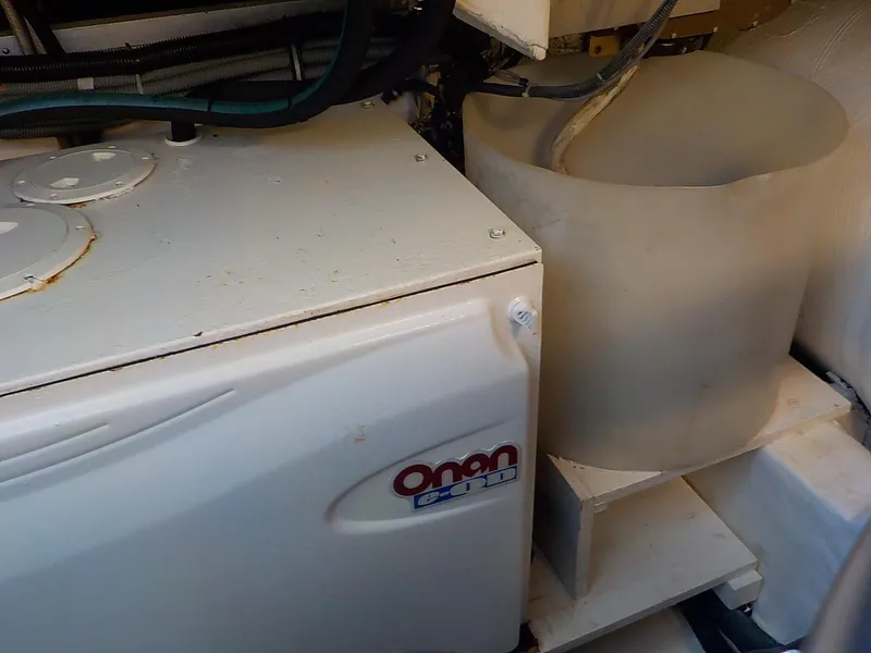 Slide: The Image of Onan Marine Genset in a 2006 Tiara Yachts 4400 Sovran. - 45