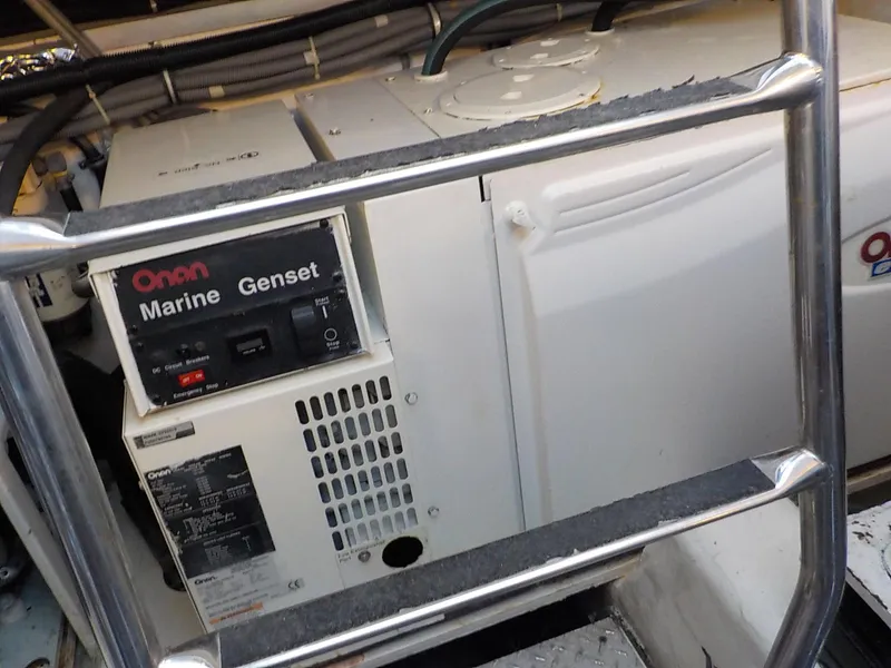 Slide: The Image of Engine room of 2006 Tiara Yachts 4400 Sovran with filter and hoses. - 46