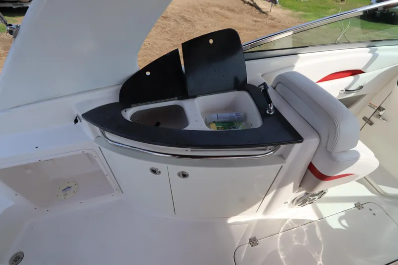Slide: The Image of 2016 Chaparral 287 SSX boat interior with sink and seating area. - 20