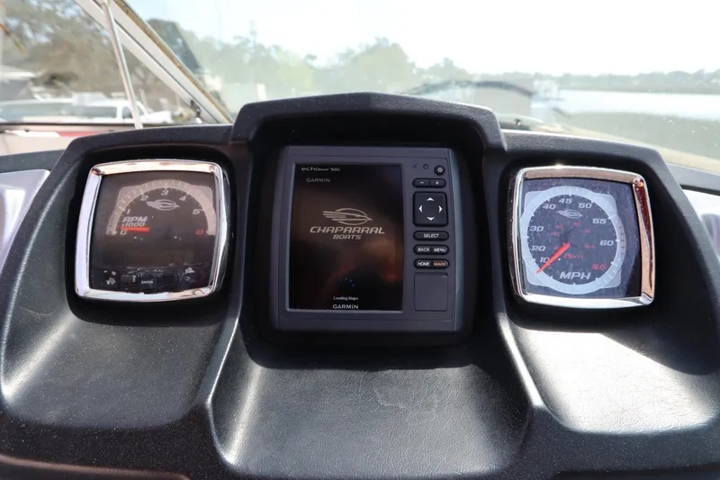 Slide: The Image of Dashboard of 2016 Chaparral 287 SSX boat with gauges and Garmin display. - 29