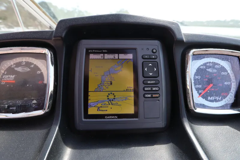 Slide: The Image of Dashboard of 2016 Chaparral 287 SSX with Garmin GPS and gauges. - 32