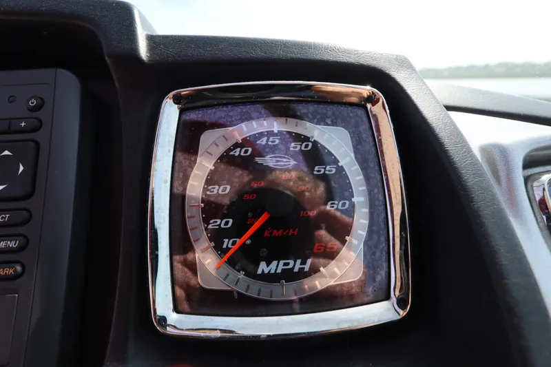 Slide: The Image of Speedometer of 2016 Chaparral 287 SSX boat, displaying speed in MPH and KM/H. - 35