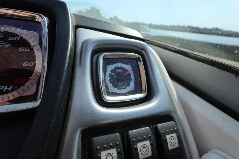 Slide: The Image of Dashboard of 2016 Chaparral 287 SSX boat with gauges and controls. - 36