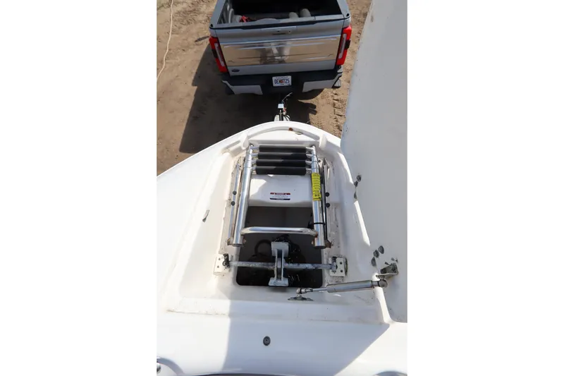 Slide: The Image of 2016 Chaparral 287 SSX boat ladder and trailer hitch connection. - 45