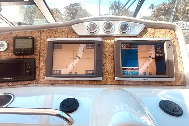 Slide: The Image of Dashboard of a 2012 Formula 45 Yacht with Garmin navigation displays. - 12
