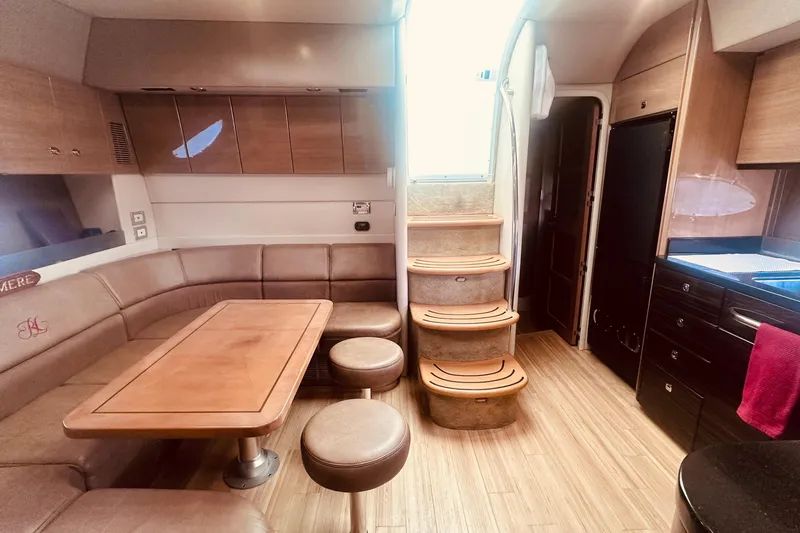 Slide: The Image of Luxurious interior of a 2012 Formula 45 Yacht with elegant seating and wooden finishes. - 17