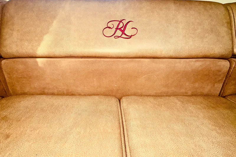 Slide: The Image of Luxurious tan leather seating on a 2012 Formula 45 Yacht with embroidered initials. - 21